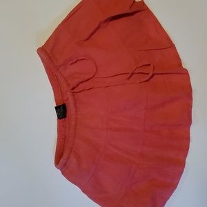 Coconut pier size sm, coral skort